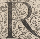 Decorative letter R illustration in vintage manuscript style.