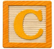 Wooden alphabet block with the letter C.