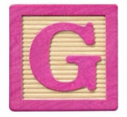 Wooden alphabet block with the letter G.