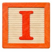 Wooden block with the letter I.