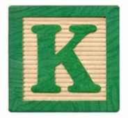 Wooden block with the letter K.
