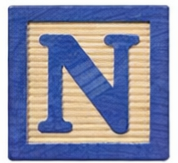 Wooden block with the letter N.