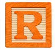 Wooden block with the letter R.