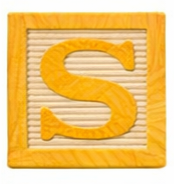 Wooden block with the letter S.