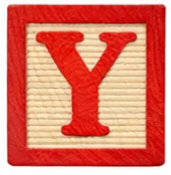Wooden block with the letter Y.